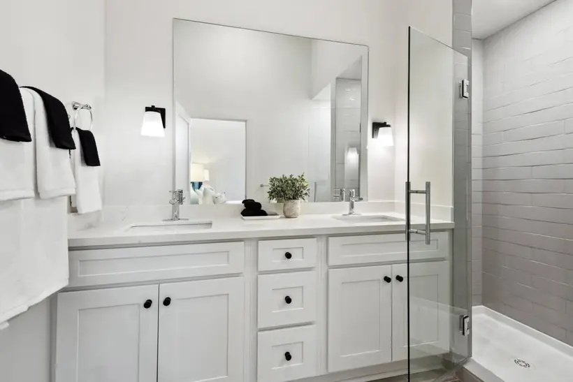 Bathroom 1 double vanity beside the accessible shower