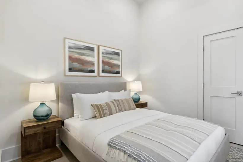 Queen bed with upholstered headboard